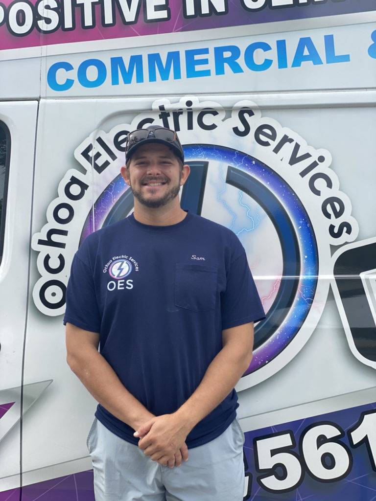 Ochoa Electric Services team member Sam (Kyle) ready for residential electrician services throughout Martin County, FL, providing safe and reliable home electrical repairs.